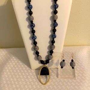 Necklace and earrings black, blue combination.